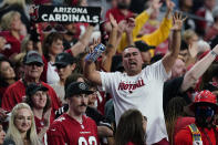 Arizona Cardinals fans cheer during an NFL football game against the Houston Texans, Sunday, Oct. 24, 2021, in Glendale, Ariz. The Cardinals won 31-5. (AP Photo/Ross D. Franklin)