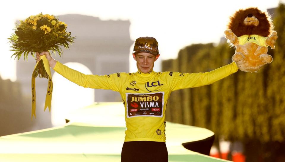 Jumbo-Visma’s Jonas Vingegaard celebrates on the podium  (REUTERS)