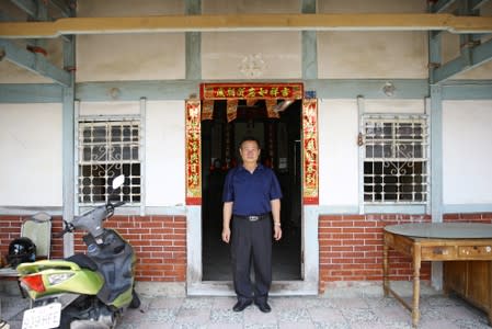 Lin Guo-cing, a senior official of the Chinese Unity Promotion Party, is pictured at his home in Tainan