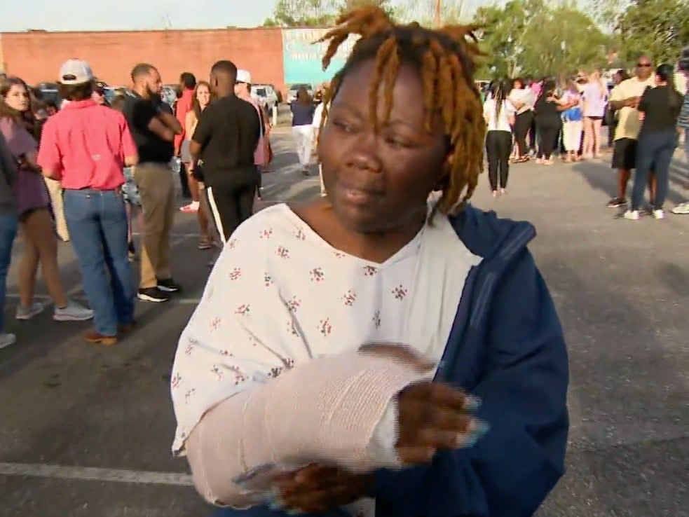 Shooting survivor Taniya Cox attends the vigil straight from hospital (Screengrab/CBS)