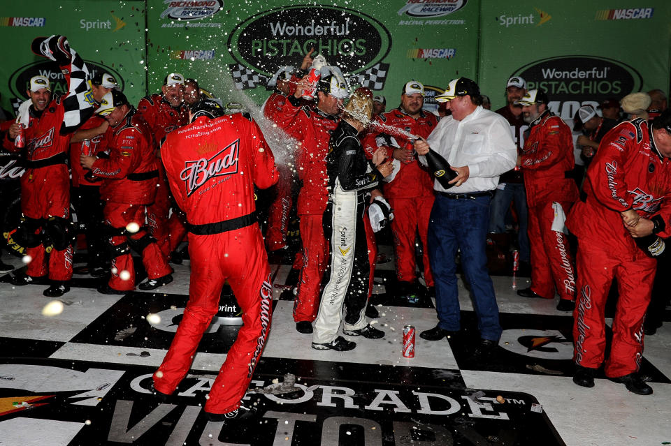 RICHMOND, VA - SEPTEMBER 10: Kevin Harvick, driver of the #29 Budweiser Chevrolet, celebrates in victory lane with his team after winning the NASCAR Sprint Cup Series Wonderful Pistachios 400 at Richmond International Raceway on September 10, 2011 in Richmond, Virginia. (Photo by Patrick Smith/Getty Images for NASCAR)