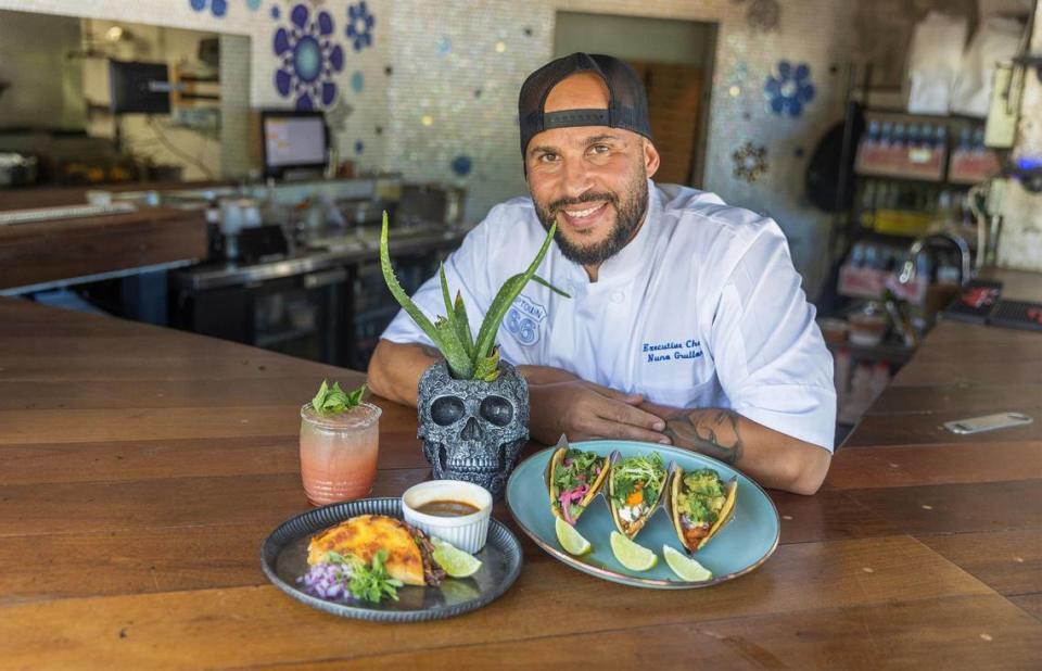 Uptown 66 owner and chef Nuno Grullon shows off the popular birria taco (left) that won the competition.