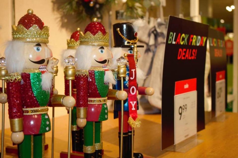 Black Friday signage sits next to nutcrackers on display at JCPenney in the Merced Mall on Nov. 26, 2021.