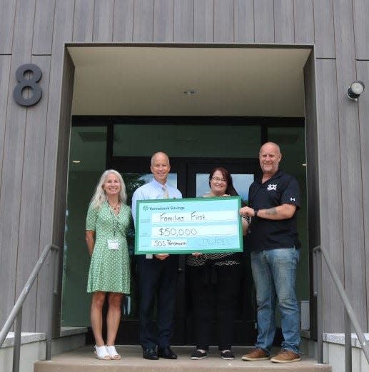 Kennebunk Savings presents a check to the Families First Capital Campaign to help fund their new health center. From left to right are Janet Laatsch, CEO of Greater Seacoast Community Health, Bradford C. Paige, President & CEO of Kennebunk Savings,  Liz Torrance, Kennebunk Savings’ Social Responsibility and Community Relations Manager, and John Burns, Executive Director of SOS Recovery Community Organization.