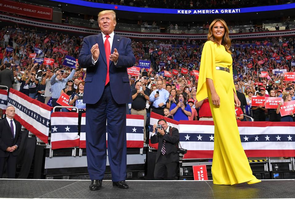 The First Lady made sure she could be seen in the 20,000 seat arena [Photo: Getty]