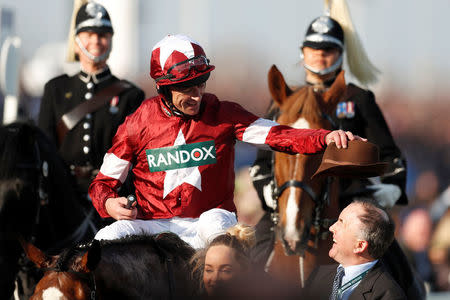 Horse Racing - Grand National Festival - Aintree Racecourse, Liverpool, Britain - April 14, 2018 Davy Russell celebrates on Tiger Roll after winning the 17:15 Randox Health Grand National Handicap Chase Action Images via Reuters/Matthew Childs