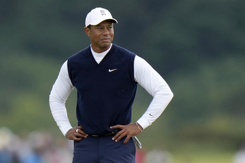 Tiger Woods of the US on the 11th hole during the first round of the British Open golf championship on the Old Course at St. Andrews, Scotland, Thursday July 14, 2022. Woods was scheduled to go to Wilmington Country Club on Tuesday, Aug. 16, 2022, for a private meeting of top players to discuss the threat of Saudi-funded LIV Golf, according to two people aware of the plans at the BMW Championship. They spoke to The Associated Press on condition of anonymity because of the privacy of the meeting. (AP Photo/Alastair Grant, File)