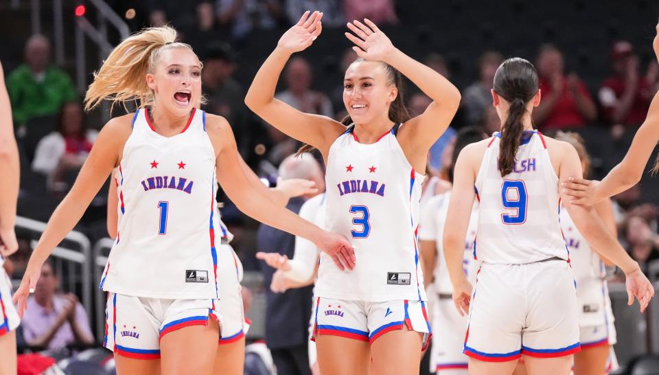 Indiana All-Star Reagan Wilson (3) celebrates a victory over the Kentucky All-Stars on June 8 in Indianapolis.