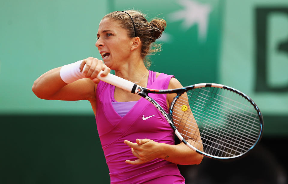 PARIS, FRANCE - JUNE 09: Sara Errani of Italy plays a forehand in the women's singles final against Maria Sharapova of Russia during day 14 of the French Open at Roland Garros on June 9, 2012 in Paris, France. (Photo by Matthew Stockman/Getty Images)