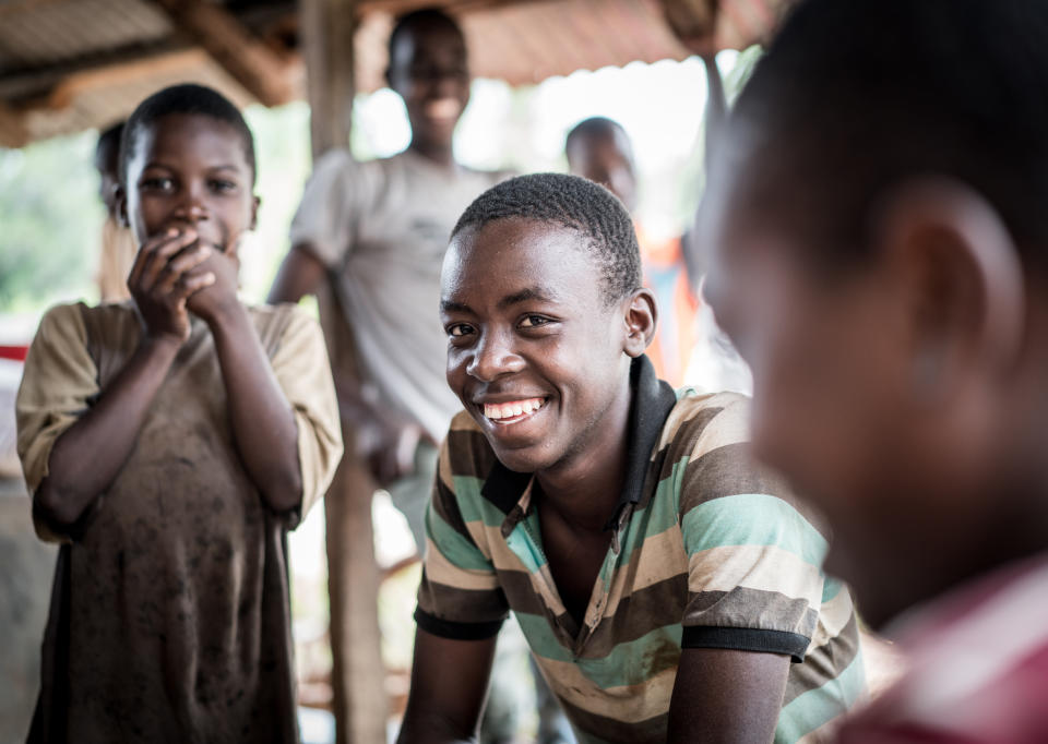 African rural kids in front of school