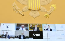 Top row, Facebook CEO Mark Zuckerberg, right, Amazon CEO Jeff Bezos, second from right, and bottom row Google CEO Sundar Pichai, left, and Apple CEO Tim Cook, second from left are sworn in remotely during a House Judiciary subcommittee on antitrust on Capitol Hill on Wednesday, July 29, 2020, in Washington. (Mandel Ngan/Pool via AP)