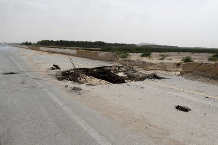 A bridge damaged by an air strike is pictured on a highway linking Yemen's capital Sanaa with the northwestern province of Hajjah, February 20, 2019. REUTERS/Khaled Abdullah