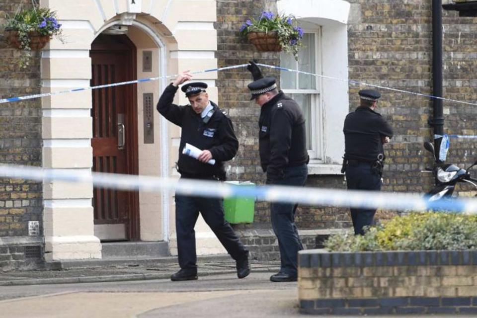 Police on the Peabody estate where Stefano Brizzi lived (Jeremy Selwyn)