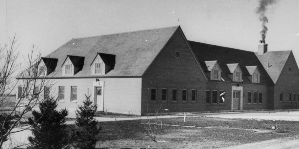 A black and white picture shows the Utah State Training School, where many sterilizations of  people thought at the time to be "feeble-minded" took place in Utah.