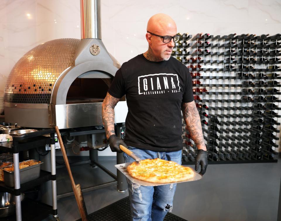 Co-owner Tony DeRienzo making pizza from an oven shipped from Italy at Giana Restaurant and Bar in Easton on Tuesday, Feb. 6, 2024.