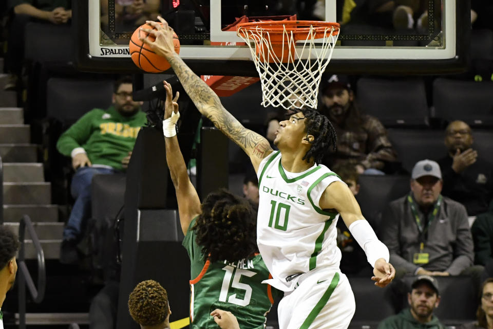 Oregon center Kel'el Ware (10) blocks a shot by Florida A&M guard Noah Meren (15) during the first half of an NCAA college basketball game Monday, Nov. 7, 2022, in Eugene, Ore. (AP Photo/Andy Nelson)