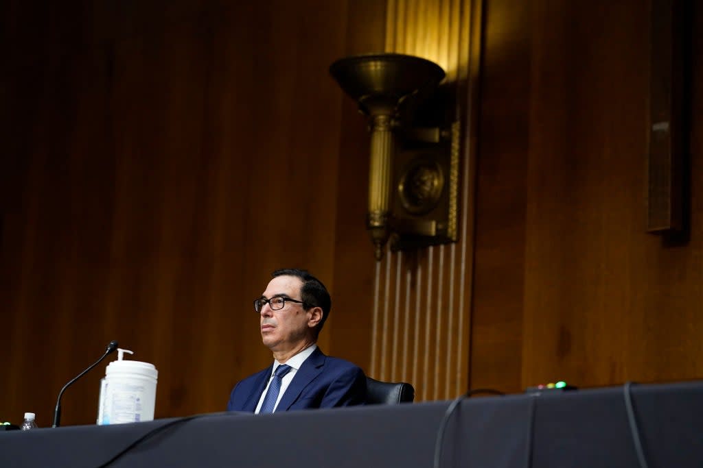 Trump Treasury Secretary Steven Mnuchin faced a grilling from Democratic lawmakers about his decision to pull funding for key Federal Reserve lending programmes for municipal funds, medium-sized businesses, and others. (Getty Images)