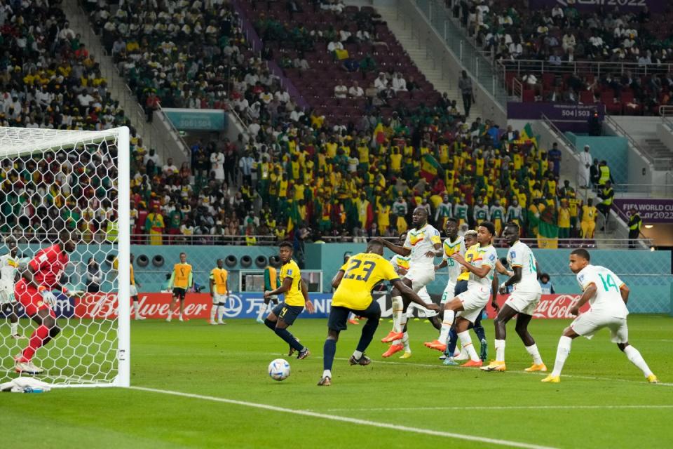 Ecuador's Moises Caicedo, second from right, scores his side's first goal during the World Cup group A football match between Ecuador and Senegal, at the Khalifa International Stadium in Doha, Qatar, Tuesday, Nov. 29, 2022. (AP Photo/Themba Hadebe)