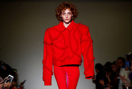 A model presents a creation during the Annakiki show at Milan Fashion Week in Milan, Italy February 20, 2019. REUTERS/Alessandro Garofalo