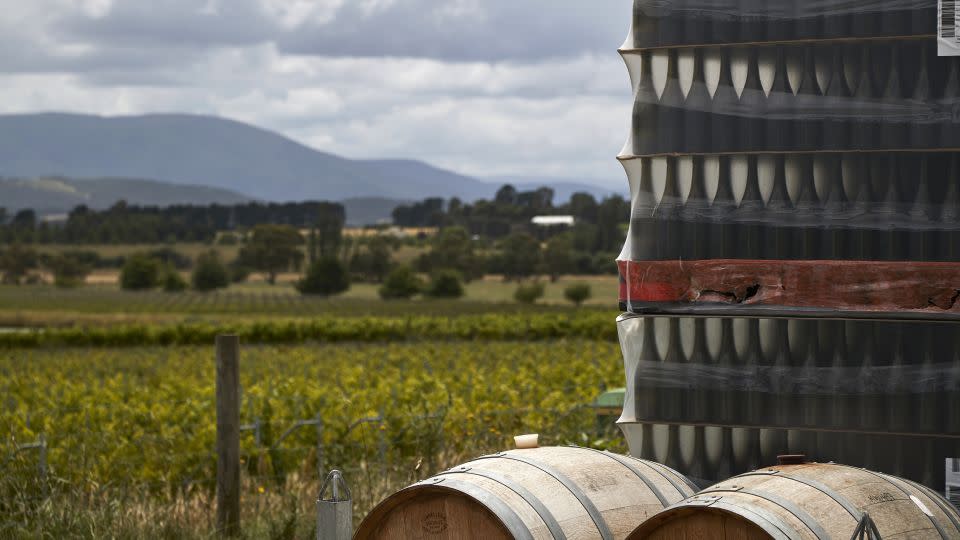 Wine barrels and pallets of bottles are stacked at a winery in the Yarra Valley, Victoria, Australia in late 2020. - James Bugg/Bloomberg/Getty Images