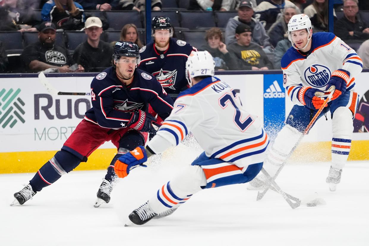 Mar 7, 2024; Columbus, Ohio, USA; Columbus Blue Jackets center Cole Sillinger (4) skates around Edmonton Oilers defenseman Brett Kulak (27) during the third period of the NHL hockey game at Nationwide Arena. The Blue Jackets won 4-2.