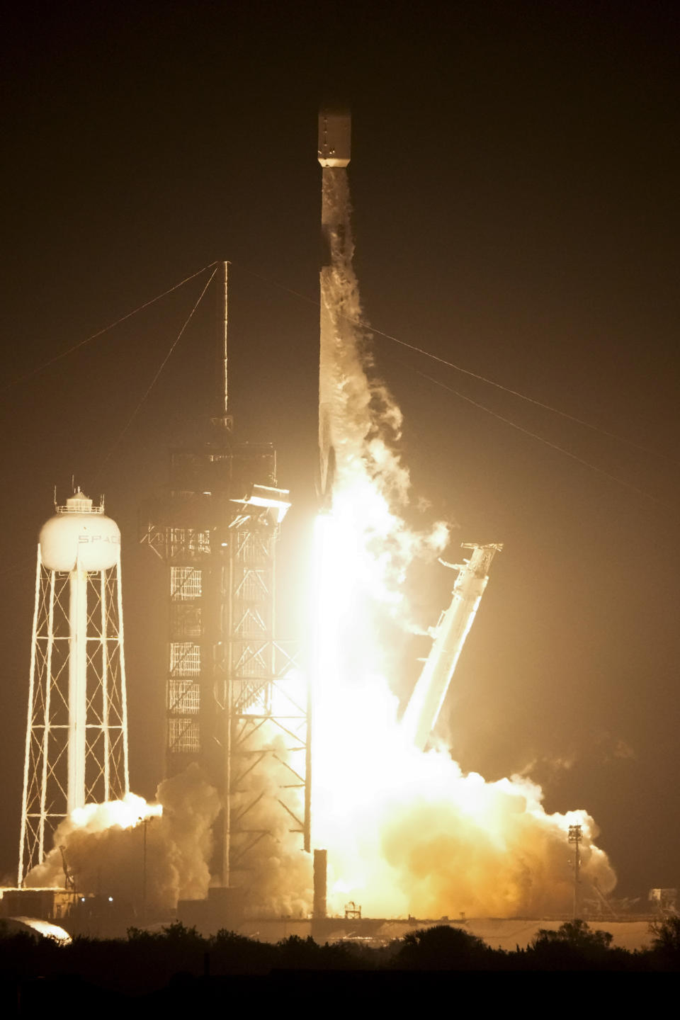 A SpaceX Falcon 9 rocket lifts off from pad 39A at Kennedy Space Center in Cape Canaveral, Fla., Thursday, Feb. 15, 2024. The rocket carried Intuitive Machines’ lunar lander on its way to the moon. If all goes well, a touchdown attempt would occur Feb. 22, after a day in lunar orbit. (AP Photo/John Raoux)