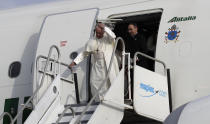 Pope Francis arrives to Tocumen international airport to attend World Youth Day events in Panama City, Wednesday, Jan. 23, 2019. Pope Francis will be in Panama Jan. 23-27. (AP Photo/Alessandra Tarantino)