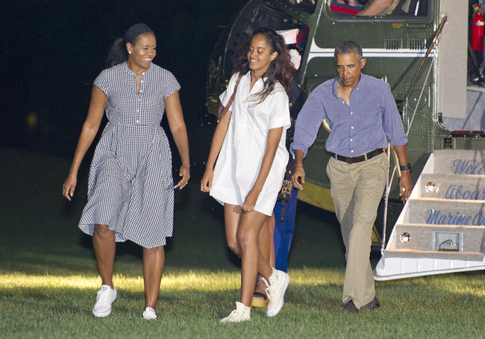 President Barack Obama and first lady Michelle Obama and daughters Malia and Sasha disembark from Marine One on the South Lawn of the White House on August 21, 2016 in Washington, DC. (Photo: Getty Images)