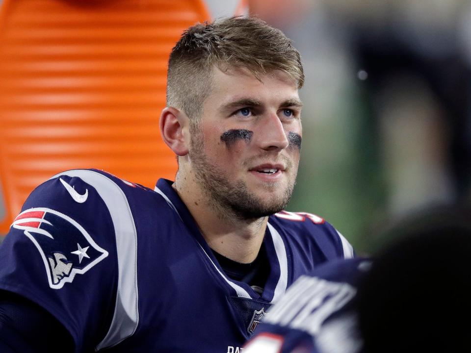 Danny Etling looks on from the sidelines during a Patriots preseason game in 2018.