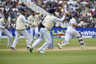 England's Joe Root, right, plays a shot during the fourth day of the fifth cricket test match between England and India at Edgbaston in Birmingham, England, Monday, July 4, 2022. (AP Photo/Rui Vieira)