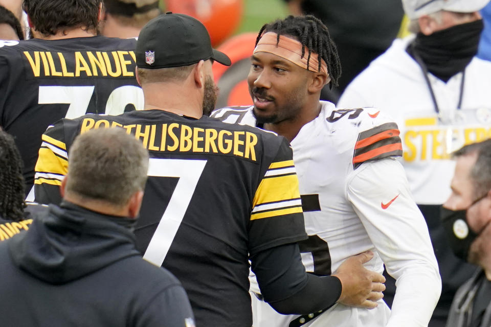 Myles Garrett was friendly with the Steelers a year after he swung his helmet at QB Mason Rudolph and started a brawl. (AP Photo/Gene J. Puskar)