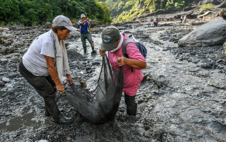 A men's superstition that considered women like Blanca Biutrago (L) and Rosalba Canon as bad luck kept them marginalized for a long time from the mines of Colombia