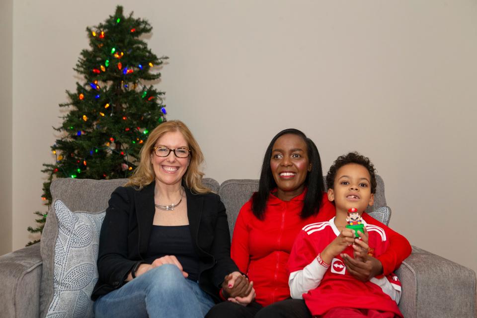 Maria Fisher (left) and Helen Jones (right) are best friends. Jones is from Kenya and is a single mom of 8 year old son Elisha. She lives in Brighton. Fisher is sighted and volunteers for the beep baseball team. Dec. 14, 2021, in Brighton, N.Y.