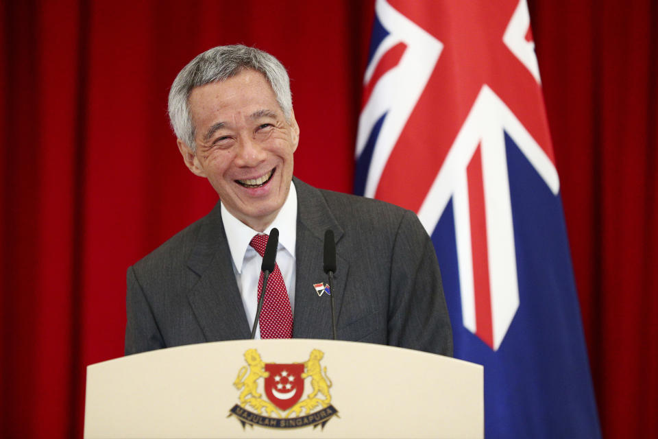 Singapore's Prime Minister Lee Hsien Loong speaks during a joint press conference with New Zealand's Prime Minister Jacinda Ardern at the Istana or presidential palace in Singapore, Friday, May 17, 2019. (AP Photo/Yong Teck Lim)