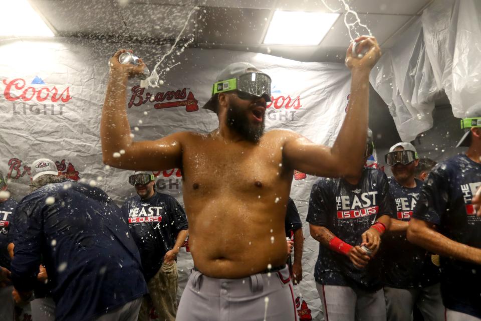 MIAMI, FLORIDA - OCTOBER 04: Kenley Jansen #74 of the Atlanta Braves celebrates after the Atlanta Braves clinched the division against the Miami Marlins at loanDepot park on October 04, 2022 in Miami, Florida. (Photo by Megan Briggs/Getty Images)