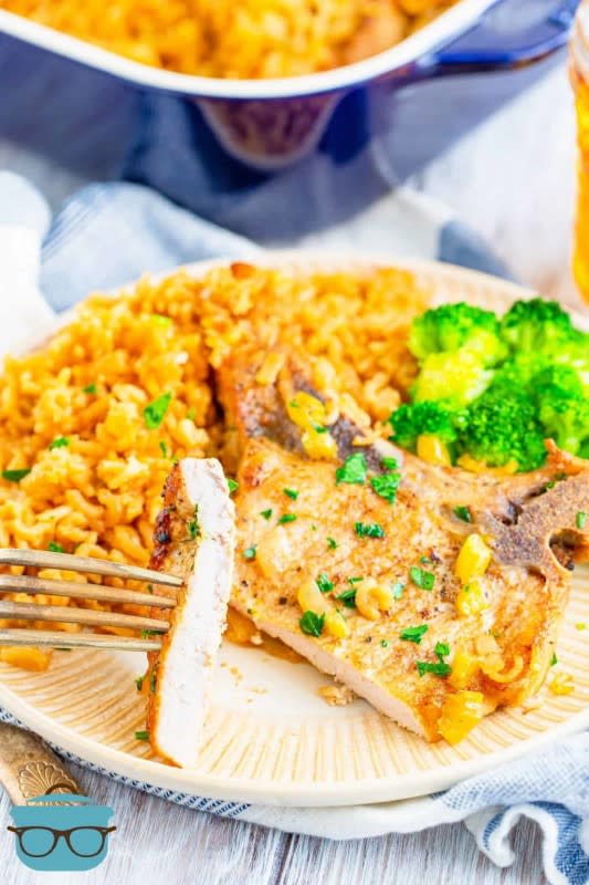 <p>The Country Cook</p><p>This baked pork chops and rice recipe is home cooking at its best. Flavorful seasoned rice and onions baked with seasoned bone-in pork chops. </p><p><strong>Get the recipe: <em><a href="https://www.thecountrycook.net/baked-pork-chops-and-rice/" rel="nofollow noopener" target="_blank" data-ylk="slk:Baked Pork Chops and Rice;elm:context_link;itc:0;sec:content-canvas" class="link ">Baked Pork Chops and Rice</a></em></strong></p>