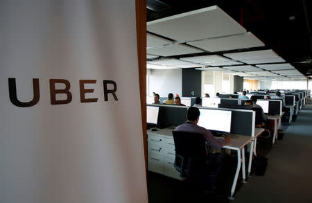 FILE PHOTO: Employees work inside Uber's Centre of Excellence (COE) office in Cairo, Egypt October 10, 2017. REUTERS/Amr Abdallah Dalsh/File Photo