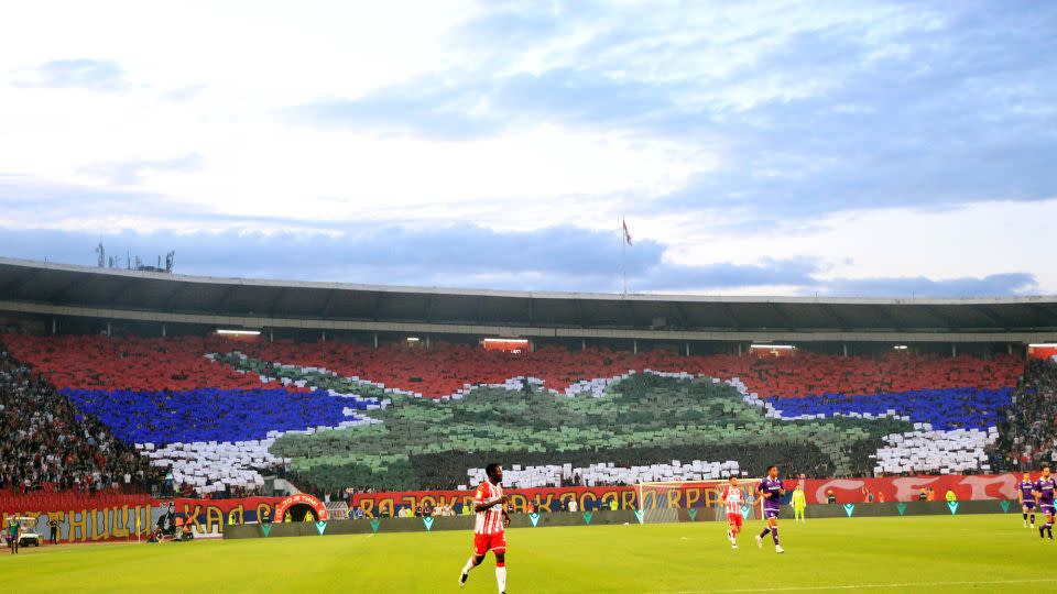 Red Star fans display a tifo with the Serbian flag, a tank T-84 and an inflammatory message, July 26, 2023. - BETAPHOTO/SIPA/Shutterstock