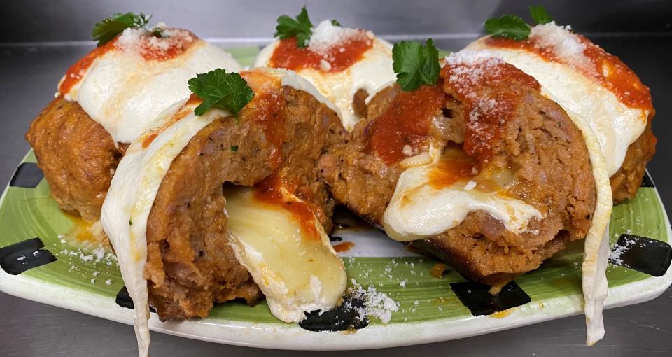 The stuffed meatball from the Italian Food Center in West Haverstraw is filled with homemade mozzarella and topped with sauce and grated parmigiana.