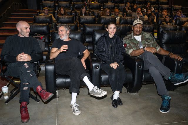 <p>Amanda Edwards/Getty</p> (L-R) Executive producer David Lowery, actors Joaquin Phoenix and Rooney Mara, and executive producer Travon Free attend the Los Angeles Special Screening of "The Smell Of Money"