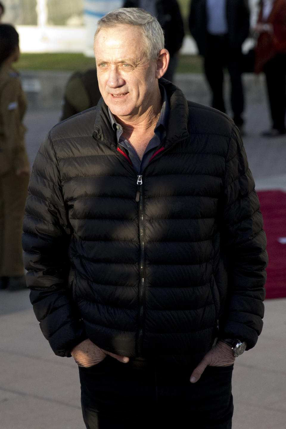 Retired Israeli military chief Lt. Gen. Benny Gantz attends the ceremony for New Israeli Chief of Staff Lt. Gen. Aviv Kochavi in Tel Aviv, Israel, Tuesday, Jan. 15, 2019. Retired Lt. Gen. Benny Gantz has been polling favorably in recent weeks, emerging as a fresh, exciting face in Israel's staid political landscape. By officially registering his new party, "Israel Resilience," Gantz shakes up a snap three-month election campaign that has been widely seen as Netanyahu's to lose. (AP Photo/Ariel Schalit)