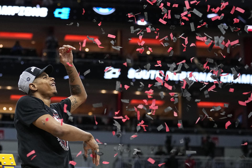 San Diego State guard Matt Bradley throws paper after a Elite 8 college basketball game between Creighton and San Diego State, in the South Regional of the NCAA Tournament, Sunday, March 26, 2023, in Louisville, Ky. San Diego State won 57-56. (AP Photo/John Bazemore)