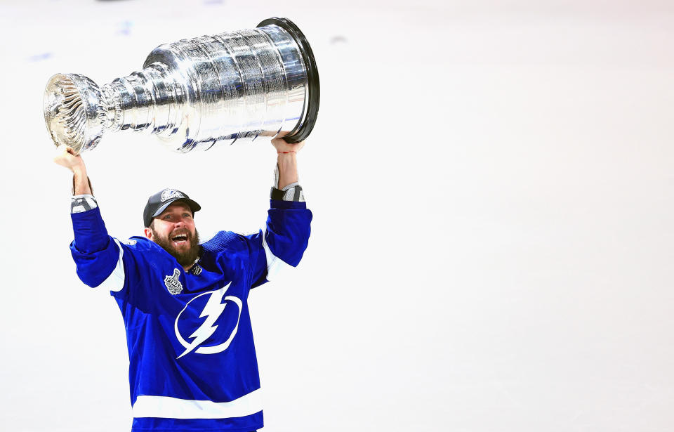 TAMPA, FLORIDA - JULY 07: Nikita Kucherov #86 of the Tampa Bay Lightning skates with the Stanley Cup following the team's victory over the Montreal Canadiens in Game Five of the 2021 NHL Stanley Cup Final at the Amalie Arena on July 07, 2021 in Tampa, Florida. The Lightning defeated the Canadiens 1-0 to take the series four games to one. (Photo by Mike Ehrmann/Getty Images)