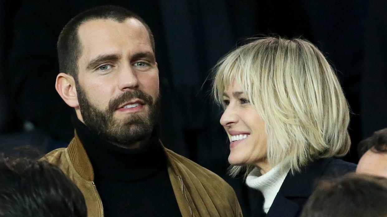 Robin Wright and Clement Giraudet attend the UEFA Champions League Round of 16 Second Leg match between Paris Saint-Germain (PSG) and Real Madrid at Parc des Princes stadium on March 6, 2018 in Paris, France