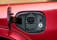 FILE PHOTO: FILE PHOTO: The charging socket is seen on Ford Motor Co's all-new electric Mustang Mach-E vehicle during a photo shoot at a studio in Warren, Michigan