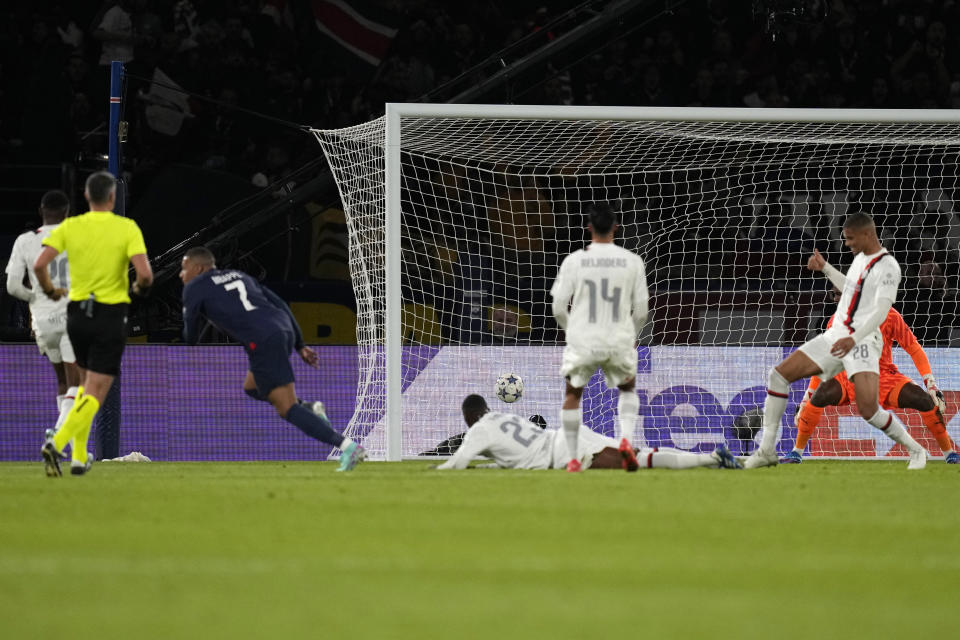 PSG's Kylian Mbappe, third from left, celebrates after scoring his side's opening goal during the Champions League group F soccer match between Paris Saint Germain and AC Milan at Parc des Princes stadium in Paris, Wednesday, Oct. 25, 2023. (AP Photo/Thibault Camus)
