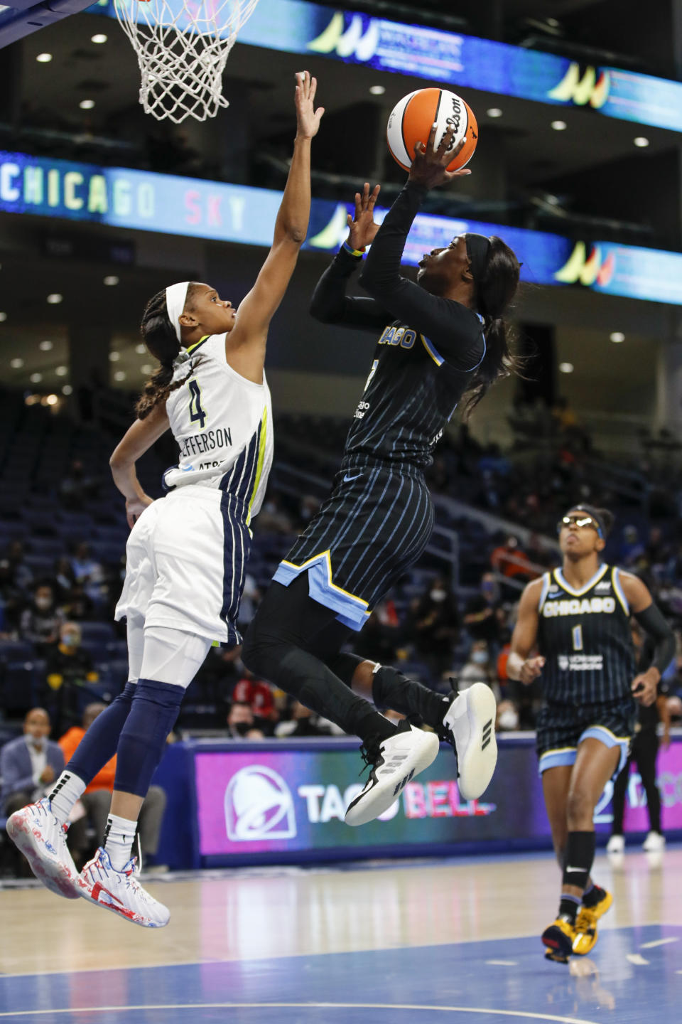 Chicago Sky guard Kahleah Copper (2) shoots against Dallas Wings guard Moriah Jefferson (4) during the first half in the first round of the WNBA basketball playoffs, Thursday, Sept. 23, 2021, in Chicago. (AP Photo/Kamil Krzaczynski)