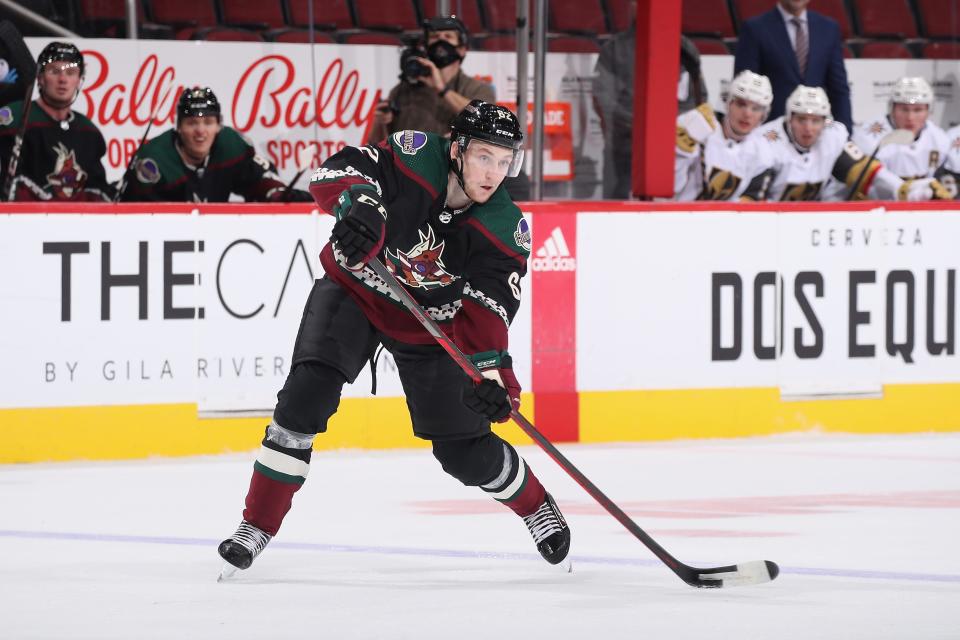 GLENDALE, ARIZONA - SEPTEMBER 17: Janis Moser #62 of the Arizona Coyotes passes the puck during the second period of the 2021 Rookie Faceoff Tournament game against the Vegas Golden Knights at Gila River Arena on September 17, 2021 in Glendale, Arizona. (Photo by Christian Petersen/Getty Images)
