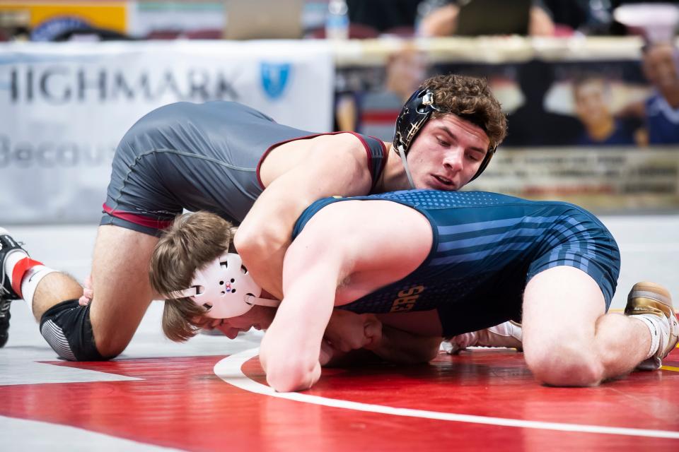 Shippensburg's Dominic Frontino (top) wrestles Franklin Regional's Gavyn Beck in a 160-pound first round bout at the PIAA Class 3A Wrestling Championships at the Giant Center on March 9, 2023, in Derry Township. Frontino won by major decision, 15-2.