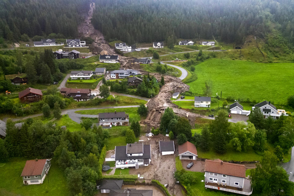 An mudslide has hit several residential buildings in Bagn in Valdres, Norway, Tuesday, Aug. 8, 2023. (Cornelius Poppe/NTB Scanpix via AP)